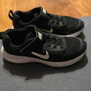 Nike boy tennis shoes. Black and white. Size 3Y